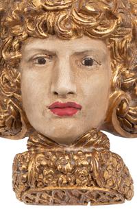 A Set of Four Italian Carved, Painted and Parcel Gilt Wall Brackets