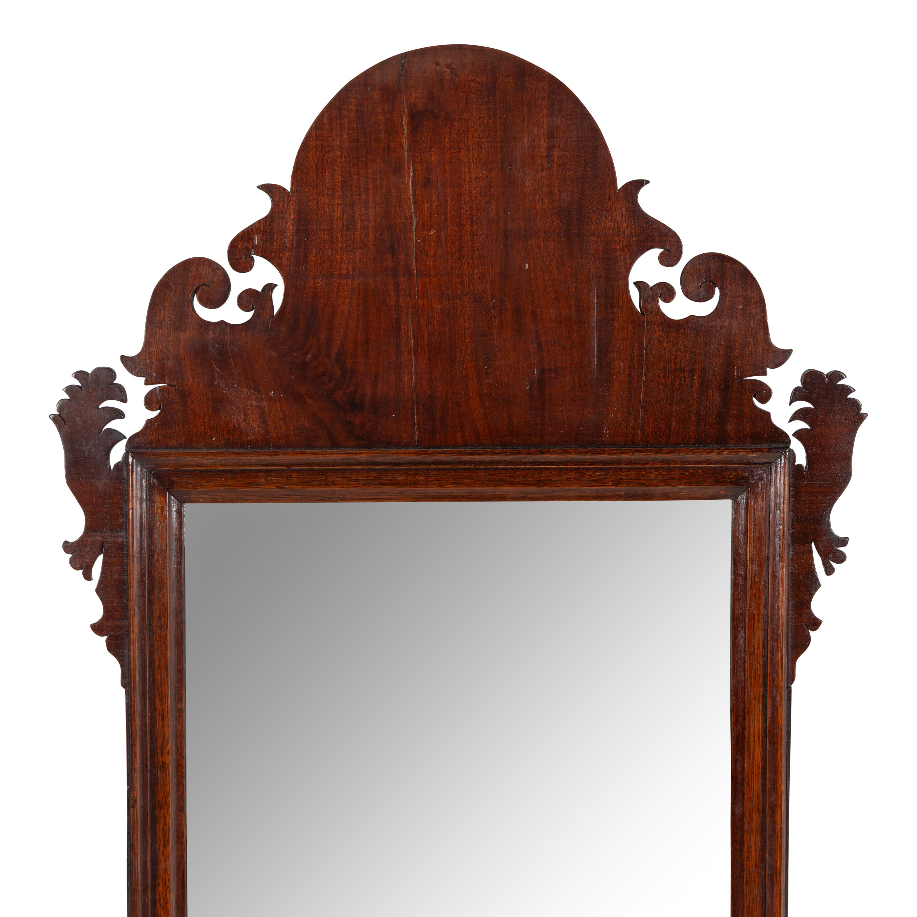 A Chippendale Carved Mahogany Looking Glass