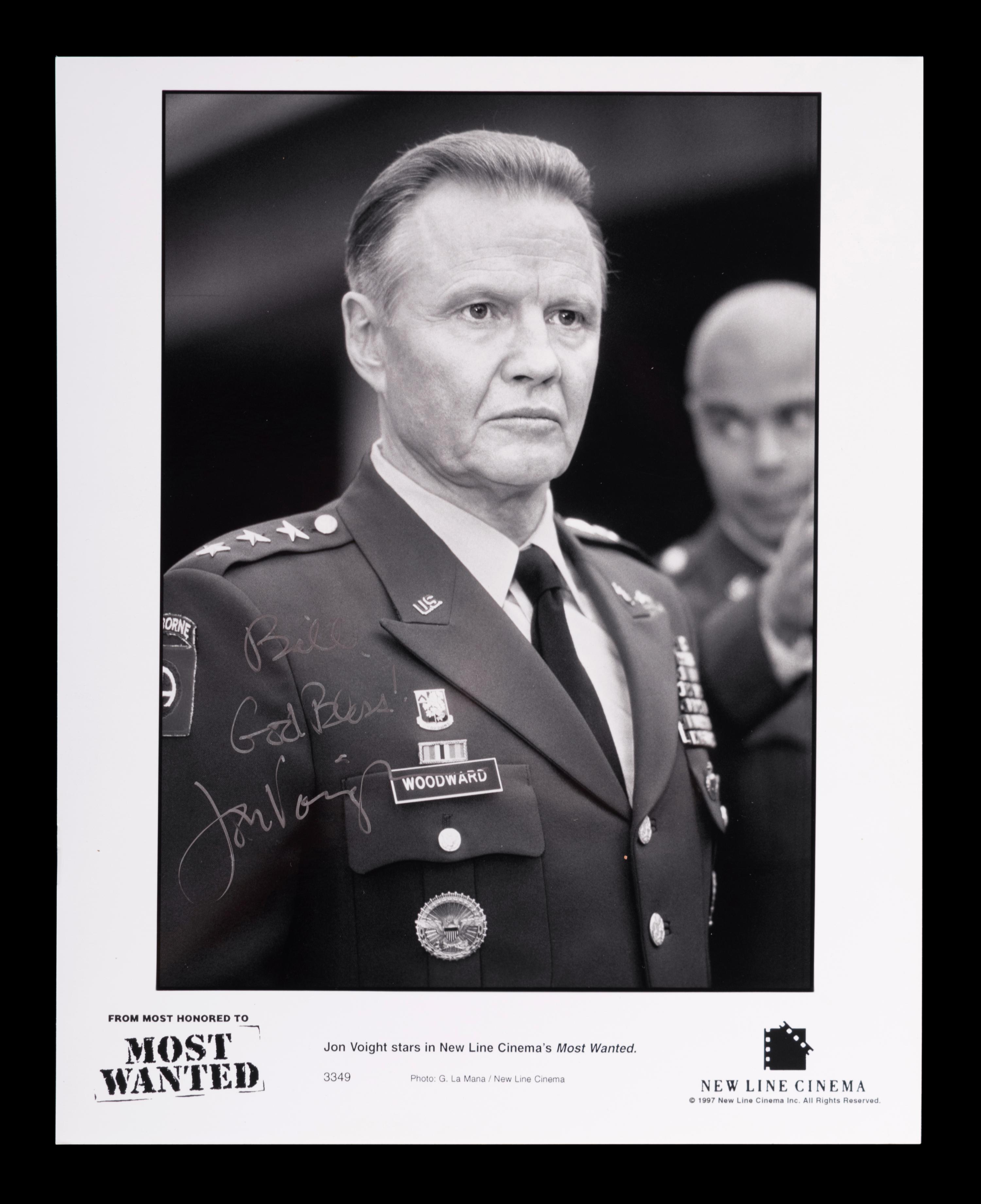(Celebrity) A group of 20 autographed photographs of celebrities, comprising: