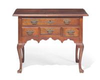 A Queen Anne walnut dressing table, Southeastern Pennsylvania, circa 1760 and later