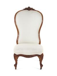 A Baroque Revival Mahogany Balloon Back Slipper Chair