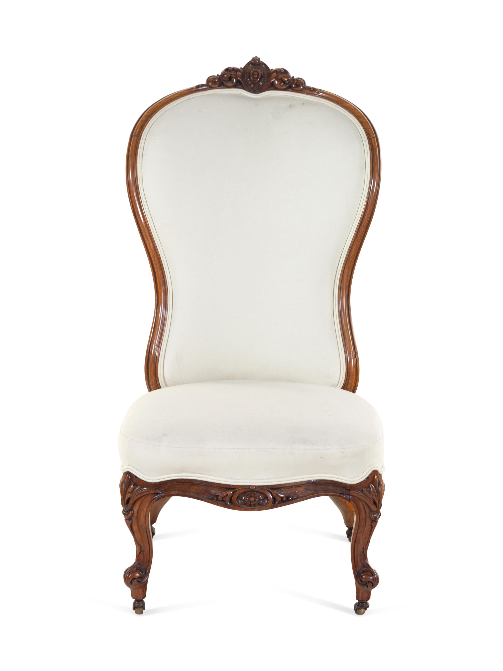 A Baroque Revival Mahogany Balloon Back Slipper Chair