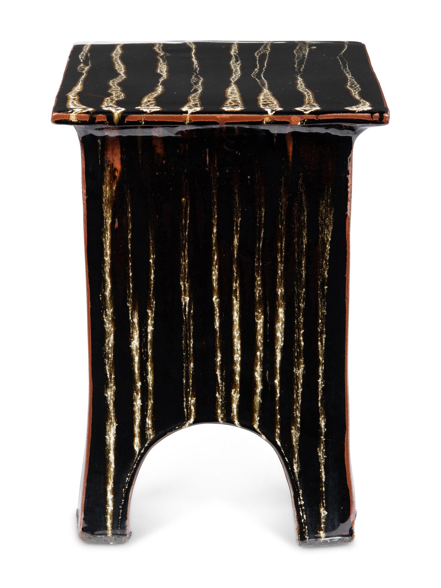 A Brown-Glazed Ceramic Side Table