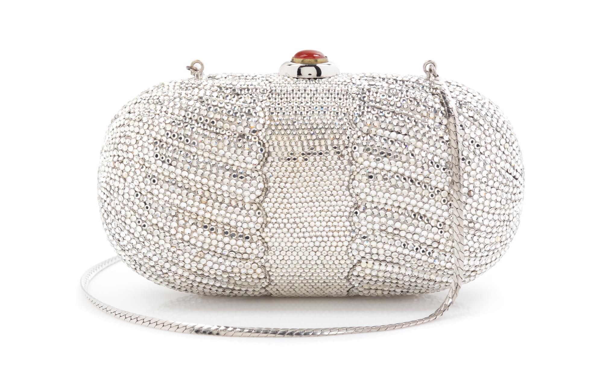 A Judith Leiber Silver Minaudiere Clutch, 6.5" x 3.5" x 2".