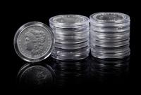 A Collection of 15 United States Morgan Silver Dollars
