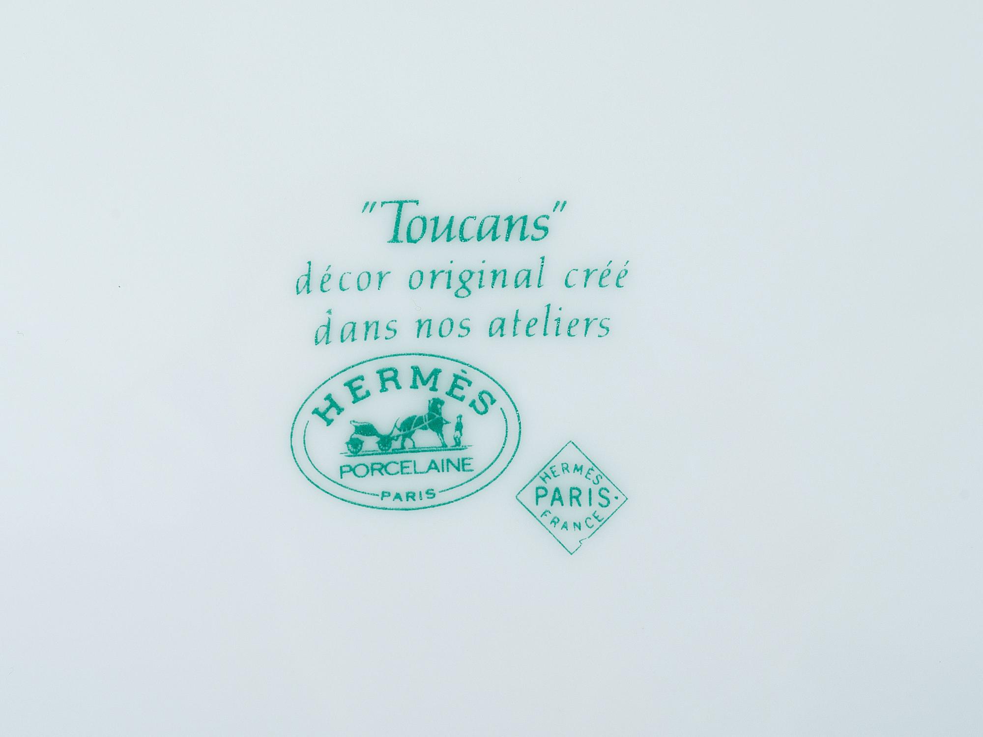 A Hermes "Toucans" Porcelain Dinner Service