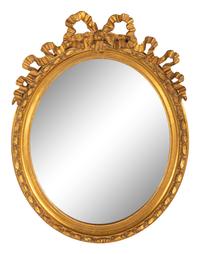 A Louis XVI Style Ribbon Decorated Parcel Gilt Mirror