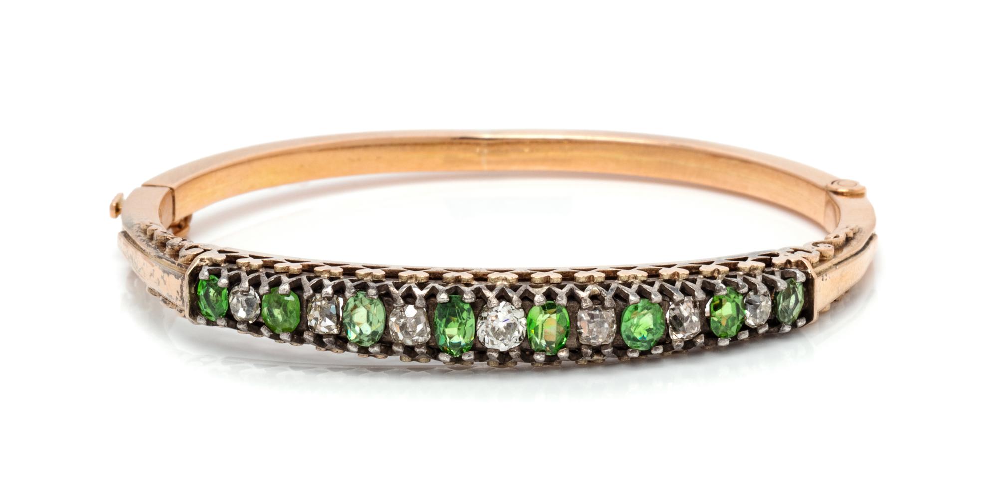 A Rose Gold, Silver, Diamond and Demantoid Garnet Bangle Bracelet, 8.00 dwts.