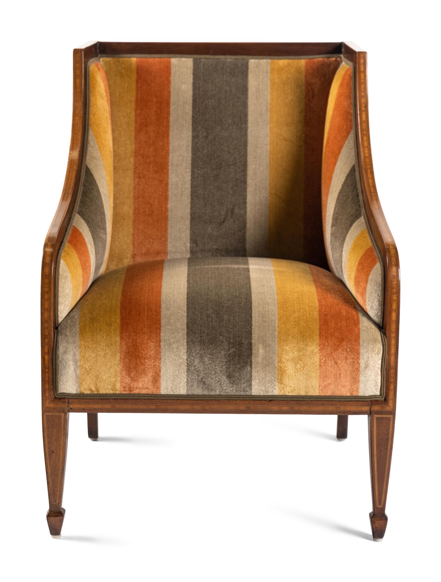 A Pair of Continental Walnut and Mahogany Bergères with Associated Ottomans