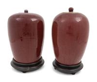 A Pair of Chinese Sang-de-Boeuf Porcelain Covered Jars