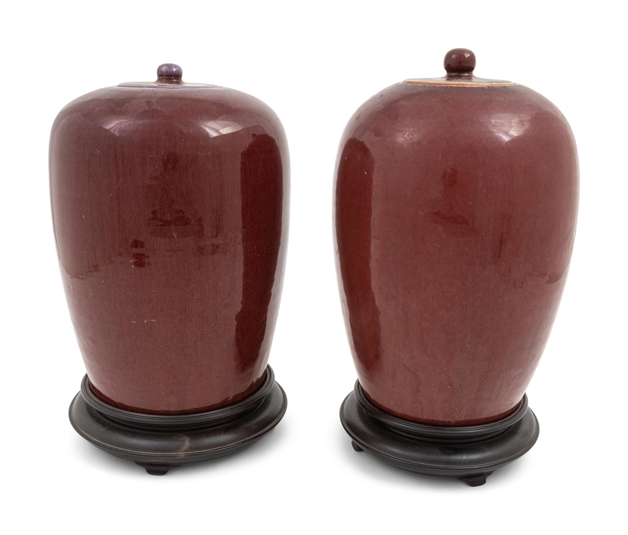 A Pair of Chinese Sang-de-Boeuf Porcelain Covered Jars