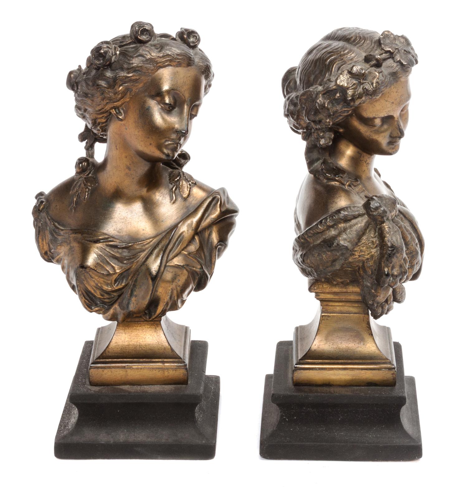 A Pair of Cast Metal Busts Height 10 1/4 inches.