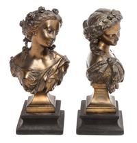 A Pair of Cast Metal Busts Height 10 1/4 inches.