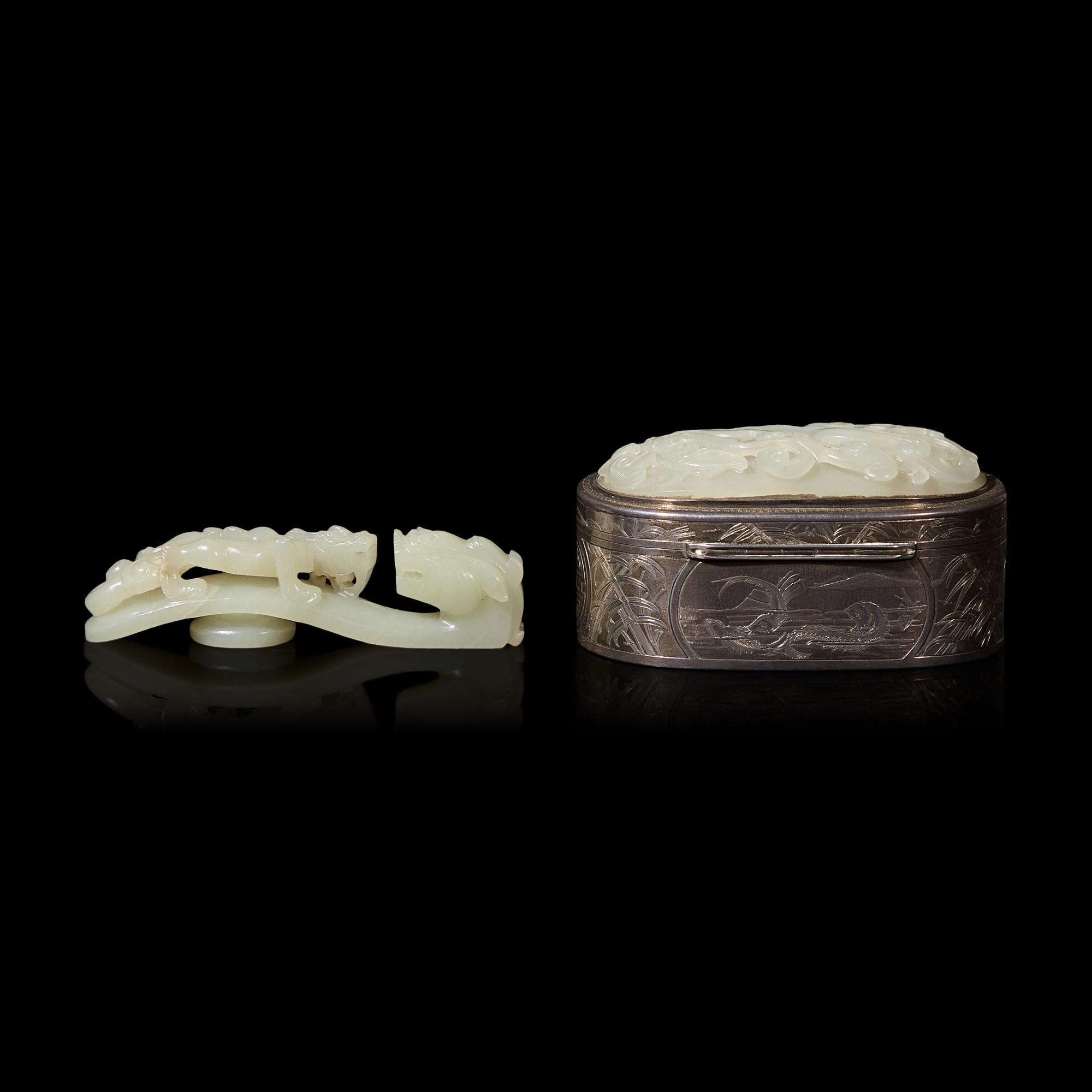 A Chinese Carved Jade Plaque-Inset Silver Box and a Jade 'Dragon' Belt Hook, 18th/19th Century 清中期 銀嵌玉牌香盒及蒼龍教子帶鈎