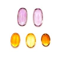 A Collection of Oval Mixed Cut Citrine and Amethysts,