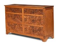 A Carved Central American Chest of Drawers