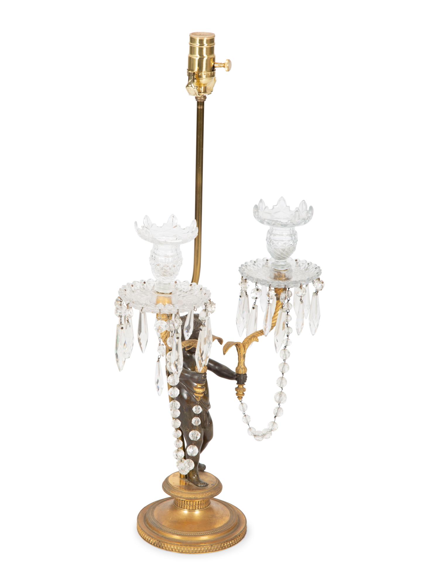 A Continental Bronze and Cut Glass Figural Candelabrum Mounted as a Lamp — 19TH CENTURY