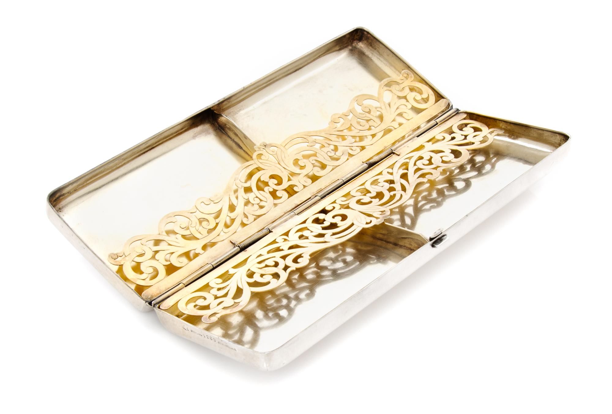 An American Silver Cigarette Case, Whiting Mfg. Co., New York, NY, retailed by J.E. Caldwell, of rectangular form, the lid decorated wi
