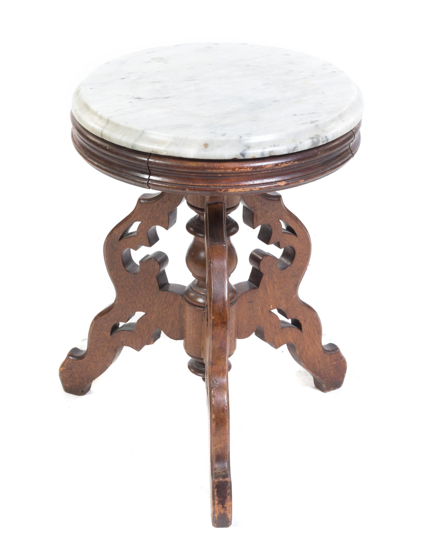 A Victorian Walnut Occasional Table Height 19 x diameter 14 1/2 inches. — 19TH CENTURY