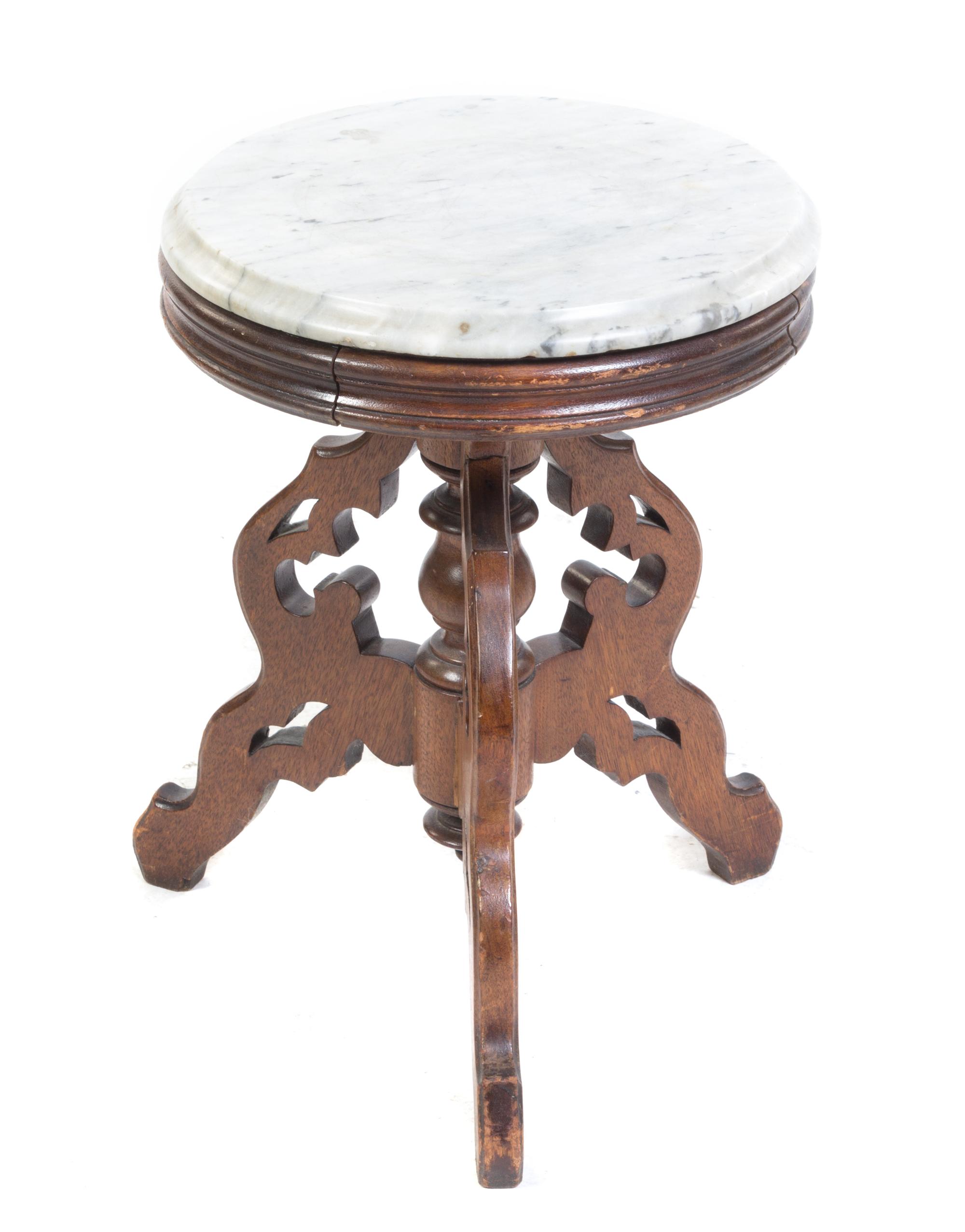 A Victorian Walnut Occasional Table Height 19 x diameter 14 1/2 inches. — 19TH CENTURY