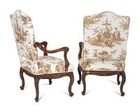 A Pair of Régence Style Walnut Fauteuils