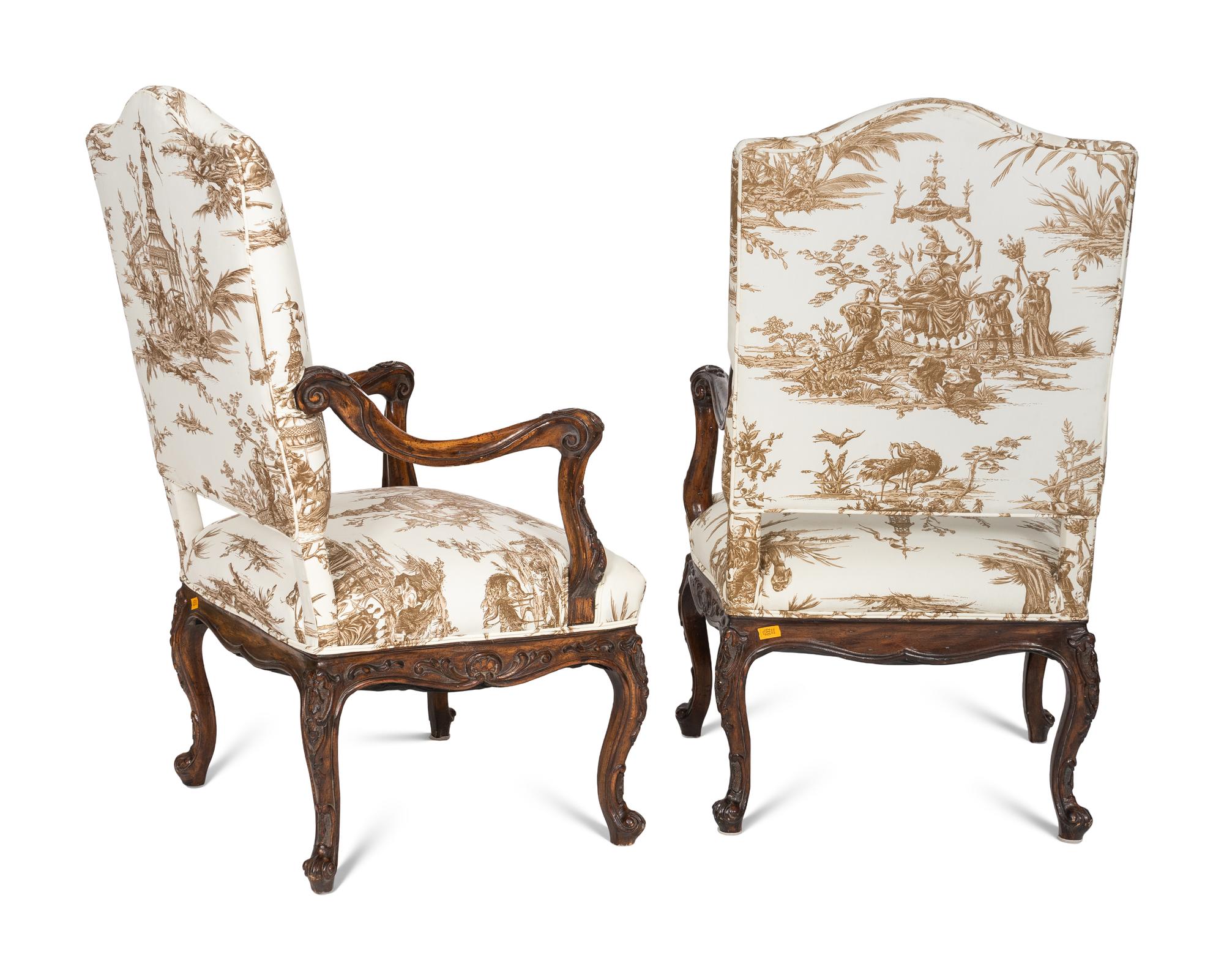 A Pair of Régence Style Walnut Fauteuils