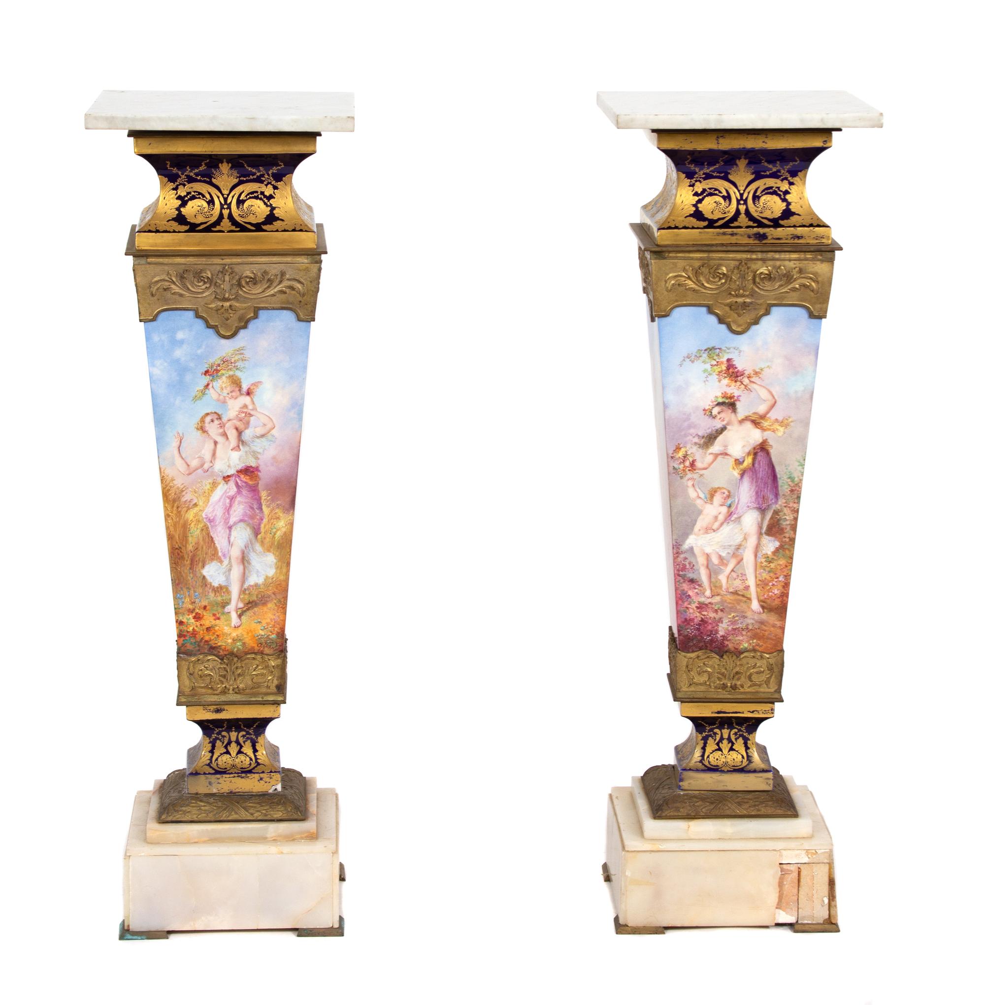 A Pair of Gilt Bronze Mounted Sevres Style Porcelain, Marble and Onyx Pedestals Height 40 1/2 inches. — 19TH CENTURY