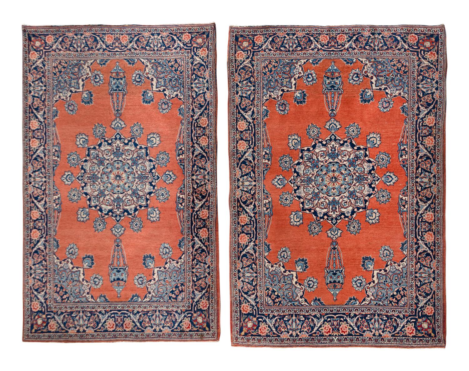 A Pair of Isfahan Silk Rugs