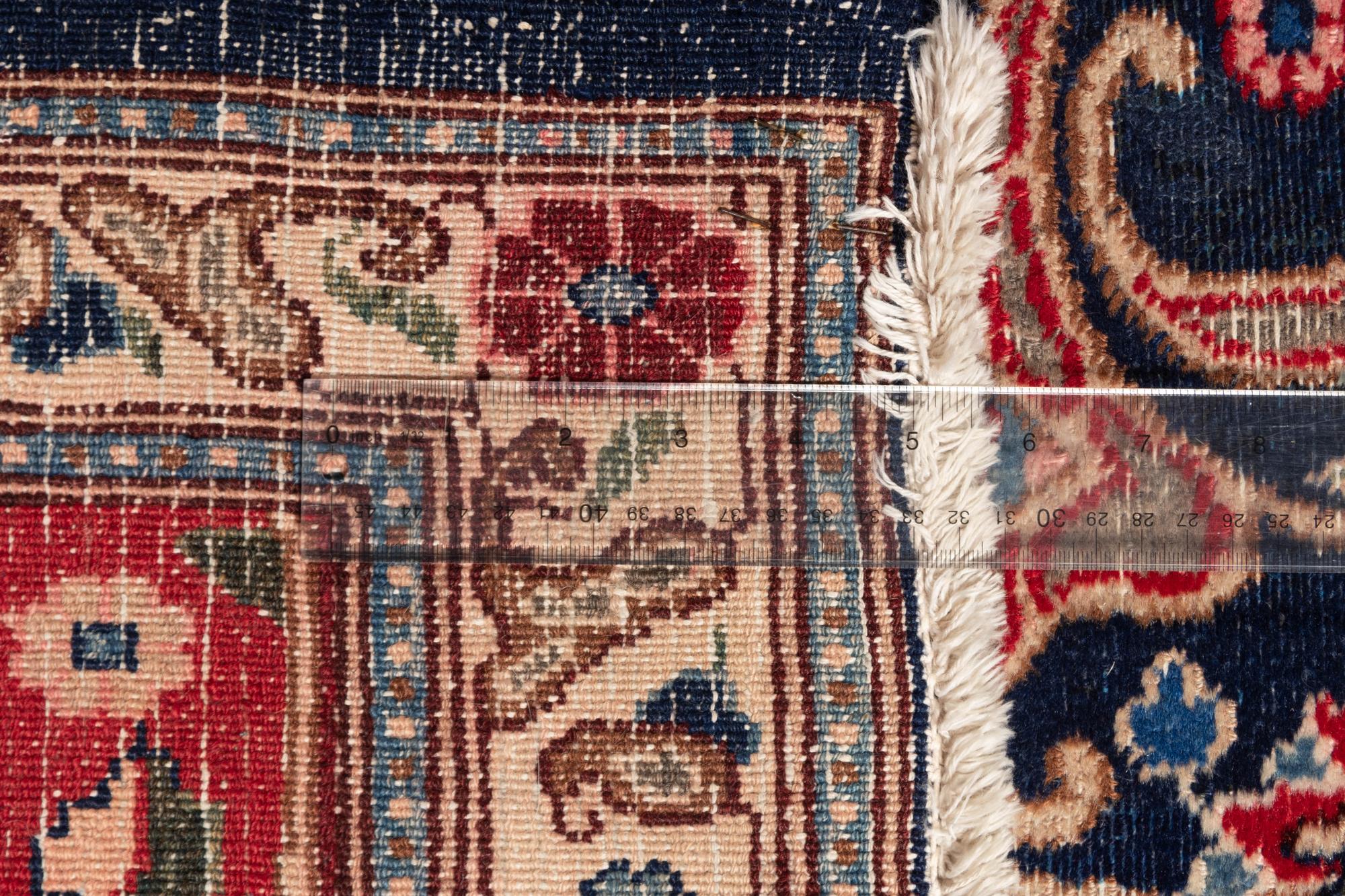 A Tabriz Wool Rug
