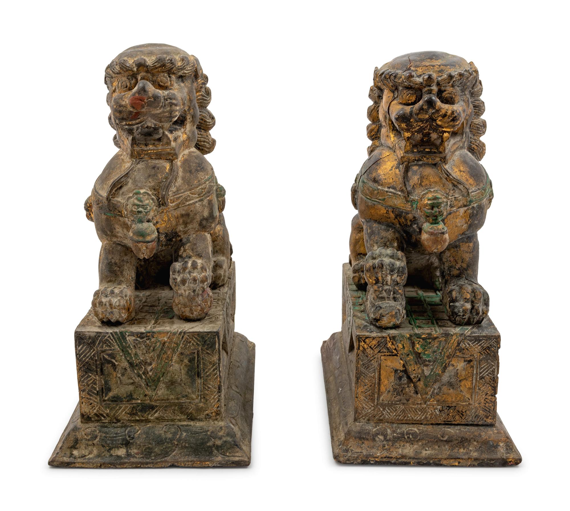 A Pair of Carved Wood Fu Lions