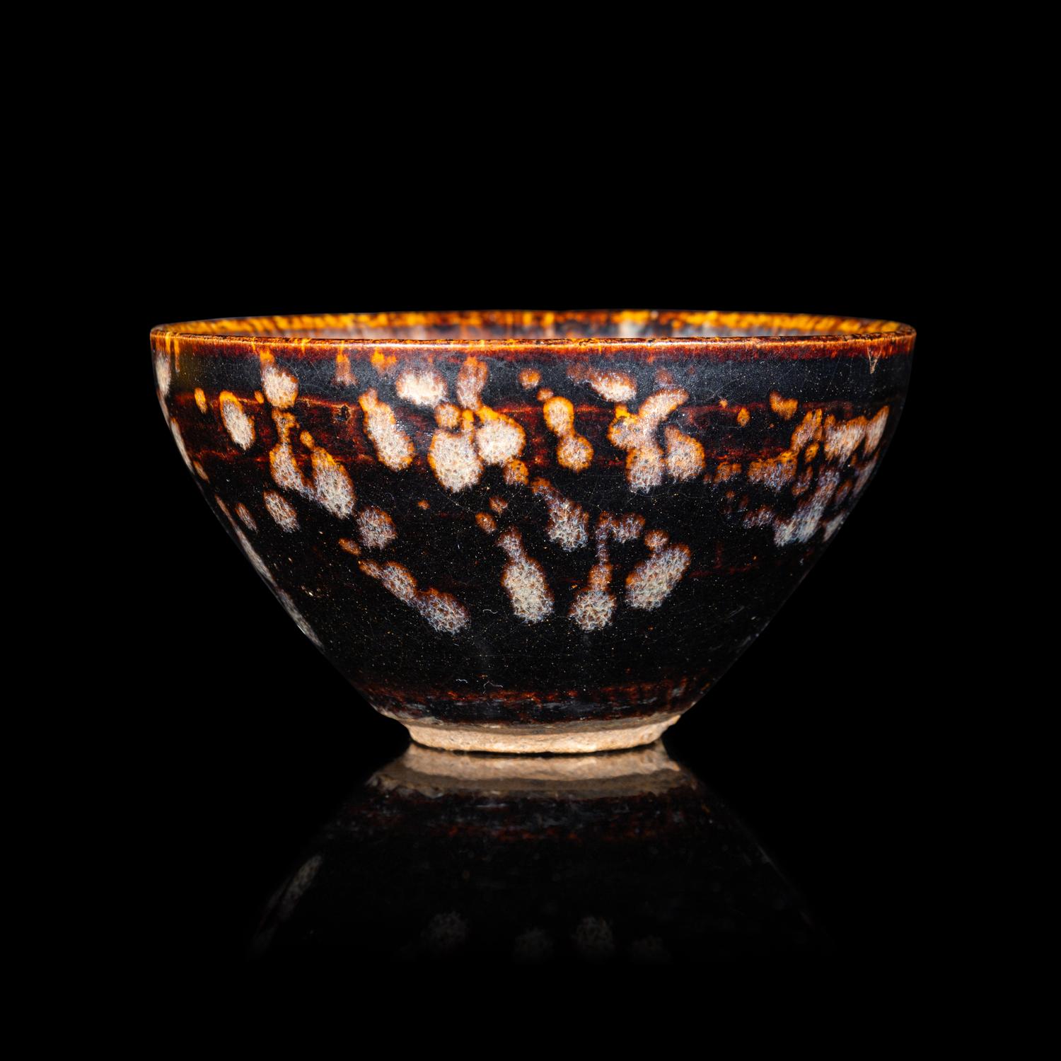 A Chinese Jizhou 'Papercut' Teabowl, Possibly Southern Song Dynasty 或為南宋 吉州窯貼花盞