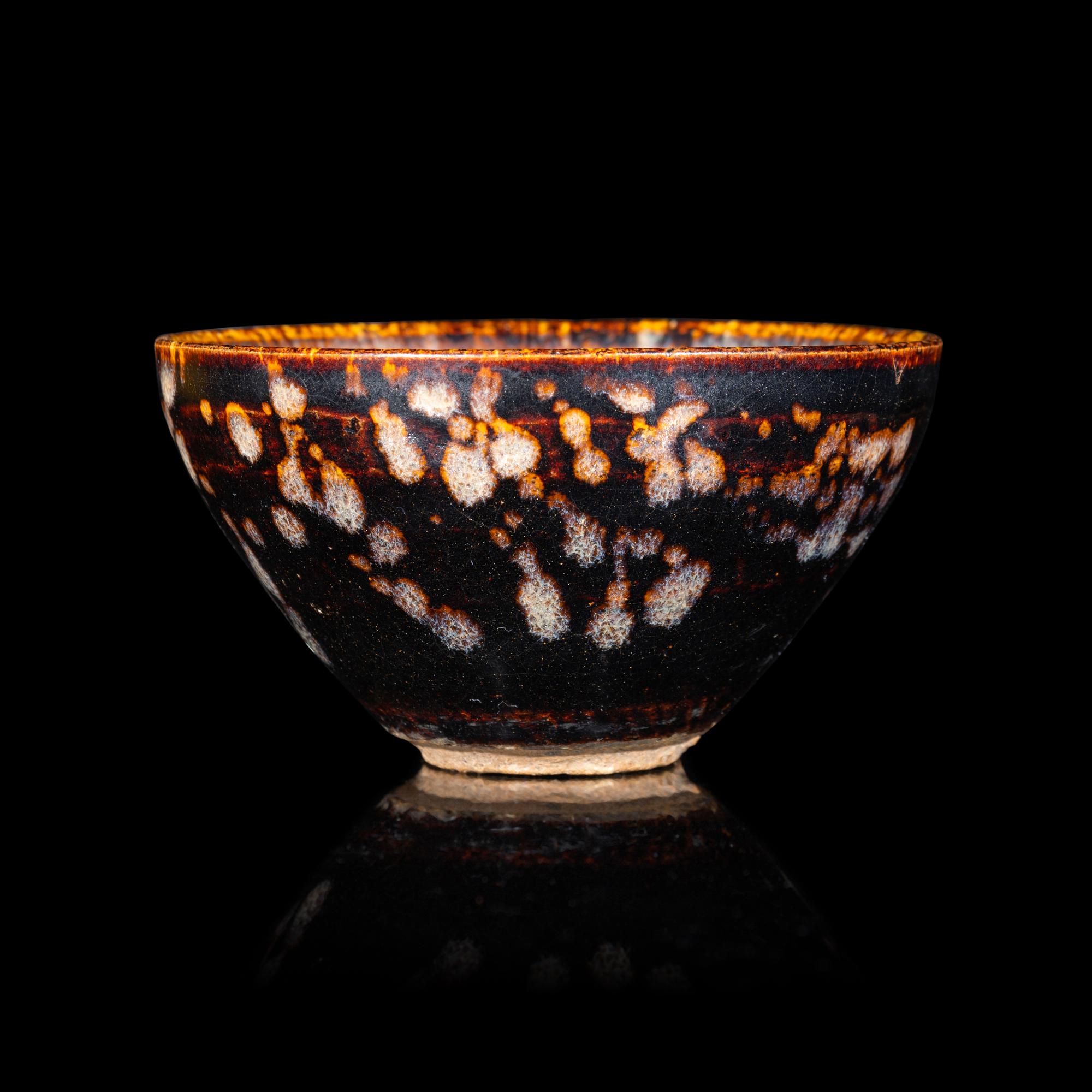 A Chinese Jizhou 'Papercut' Teabowl, Possibly Southern Song Dynasty 或為南宋 吉州窯貼花盞