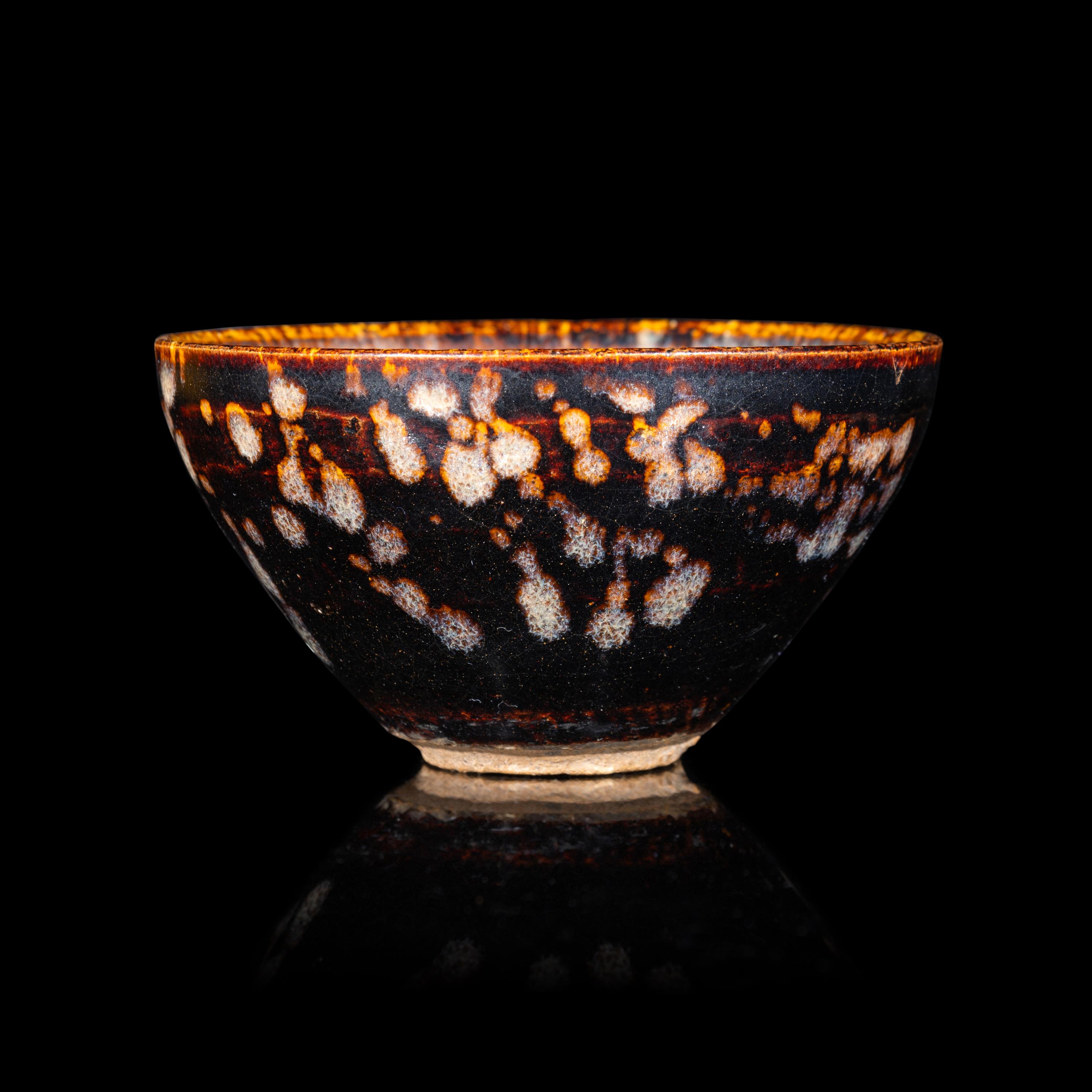 A Chinese Jizhou 'Papercut' Teabowl, Possibly Southern Song Dynasty 或為南宋 吉州窯貼花盞