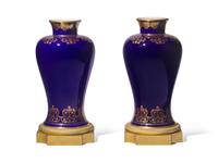 A Pair of Sevres Porcelain 'Bleu du Roi' Parcel-Gilt and Gilt-Bronze Mounted Vases DONATED BY JAMIE DRAKE