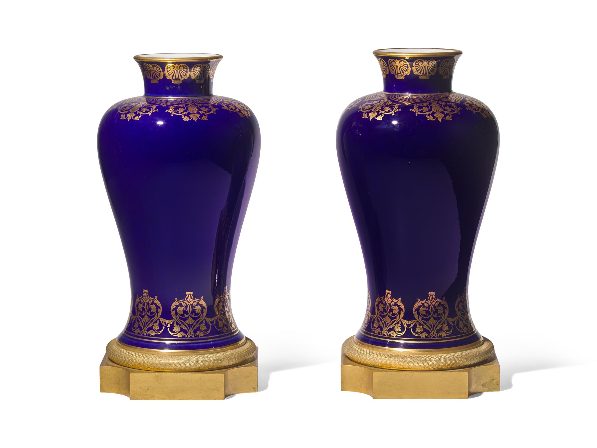 A Pair of Sevres Porcelain 'Bleu du Roi' Parcel-Gilt and Gilt-Bronze Mounted Vases DONATED BY JAMIE DRAKE