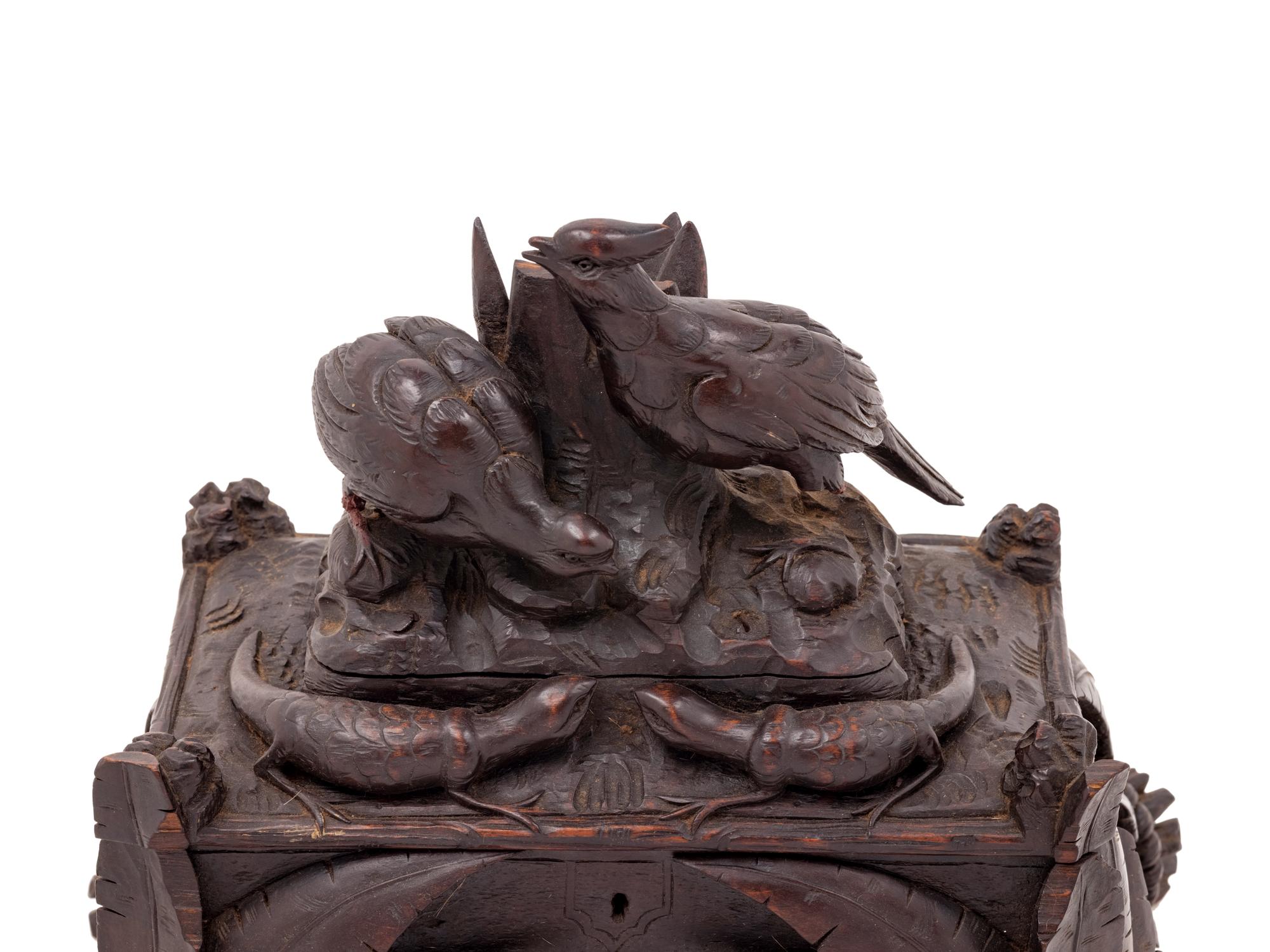 A Black Forest Carved Table Casket