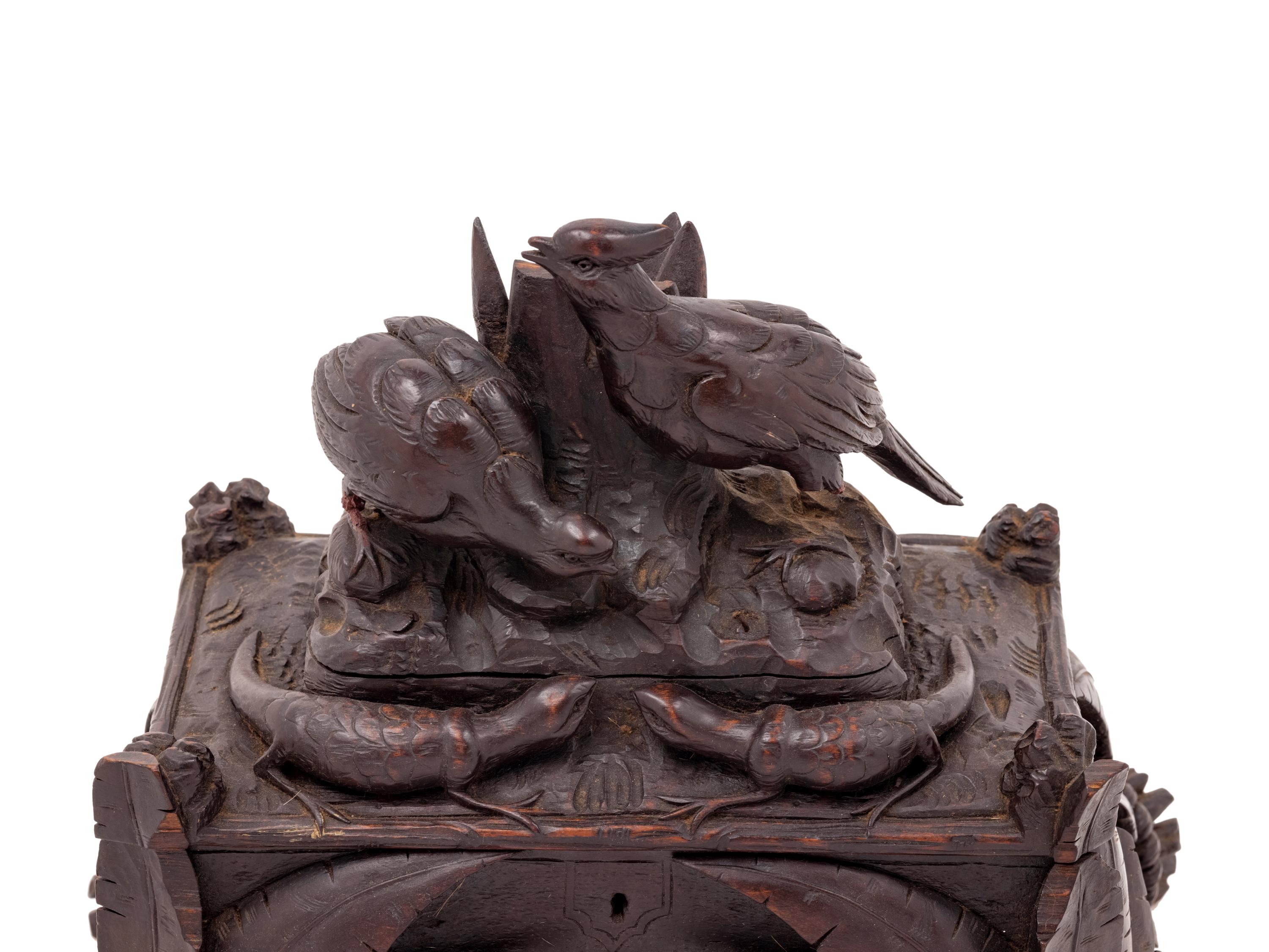 A Black Forest Carved Table Casket
