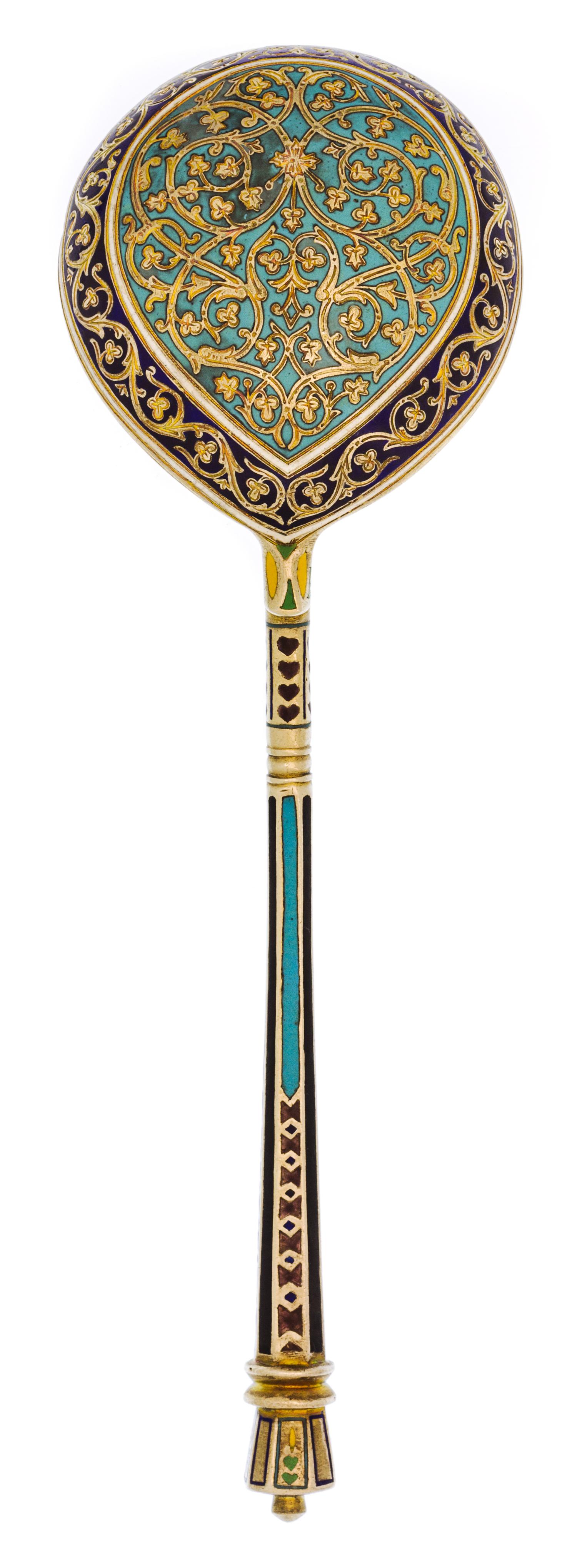 A Russian Silver and Enamel Spoon, Maker's mark likely of P. Ovchinnikov, assay mark obscured, Moscow, 1878, the handle with polychrome