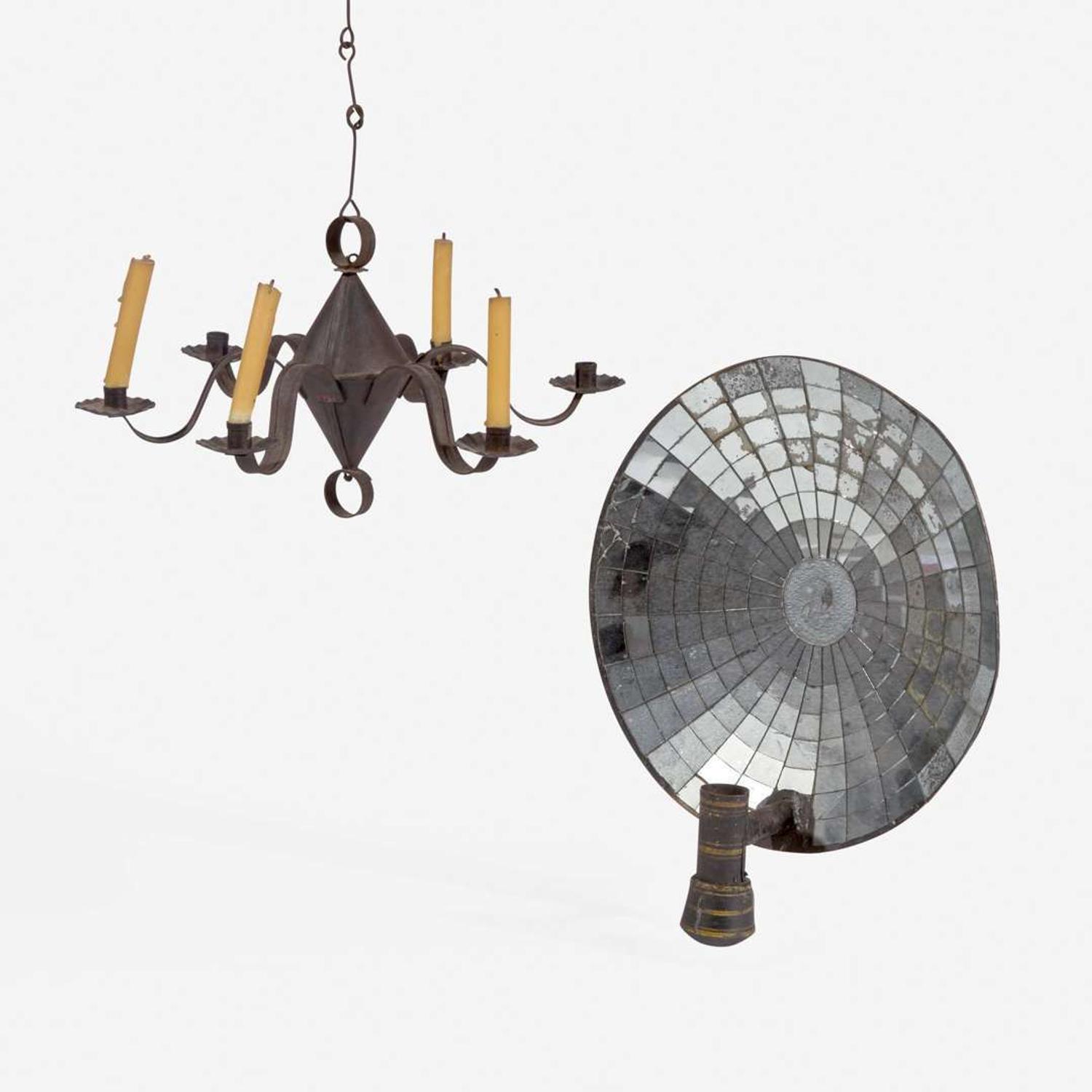 A miniature tinware chandelier and mirrored tin candle sconce 19th century