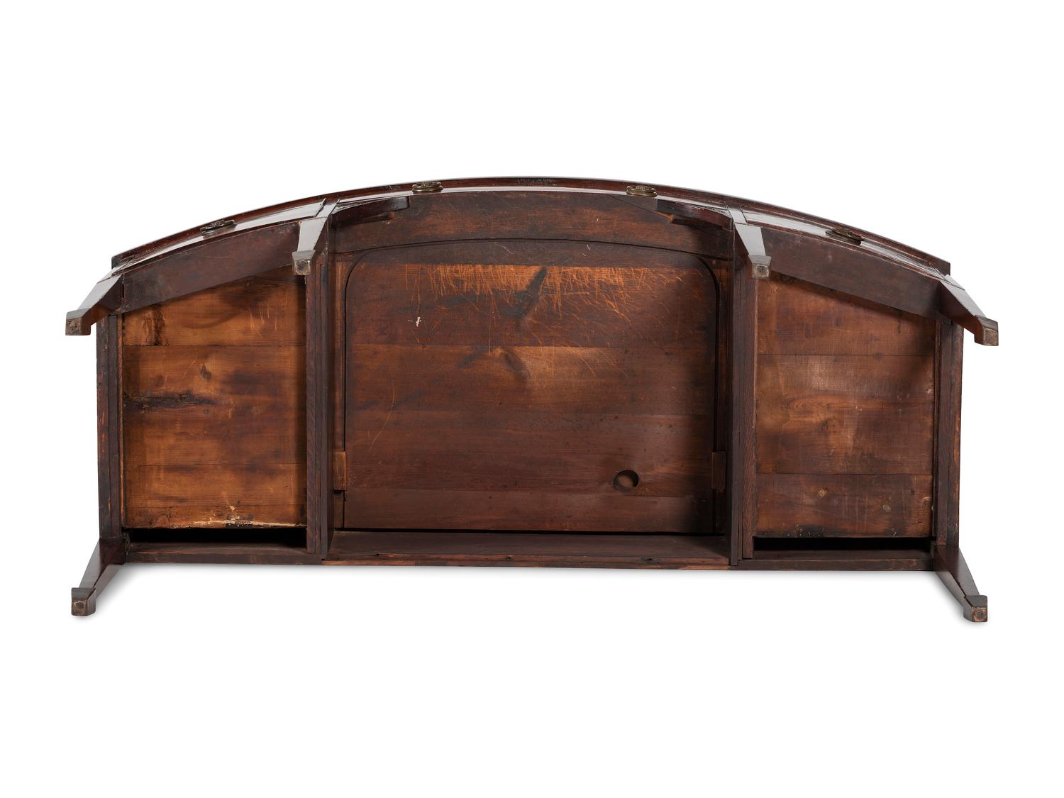 A Regency Carved, Inlaid and Figured Mahogany Bowfront Sideboard