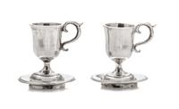 A Pair of American Silver Cups and Saucers, Obadiah Fisher, New York, NY, each having a C-scroll handle and a baluster form body surmou
