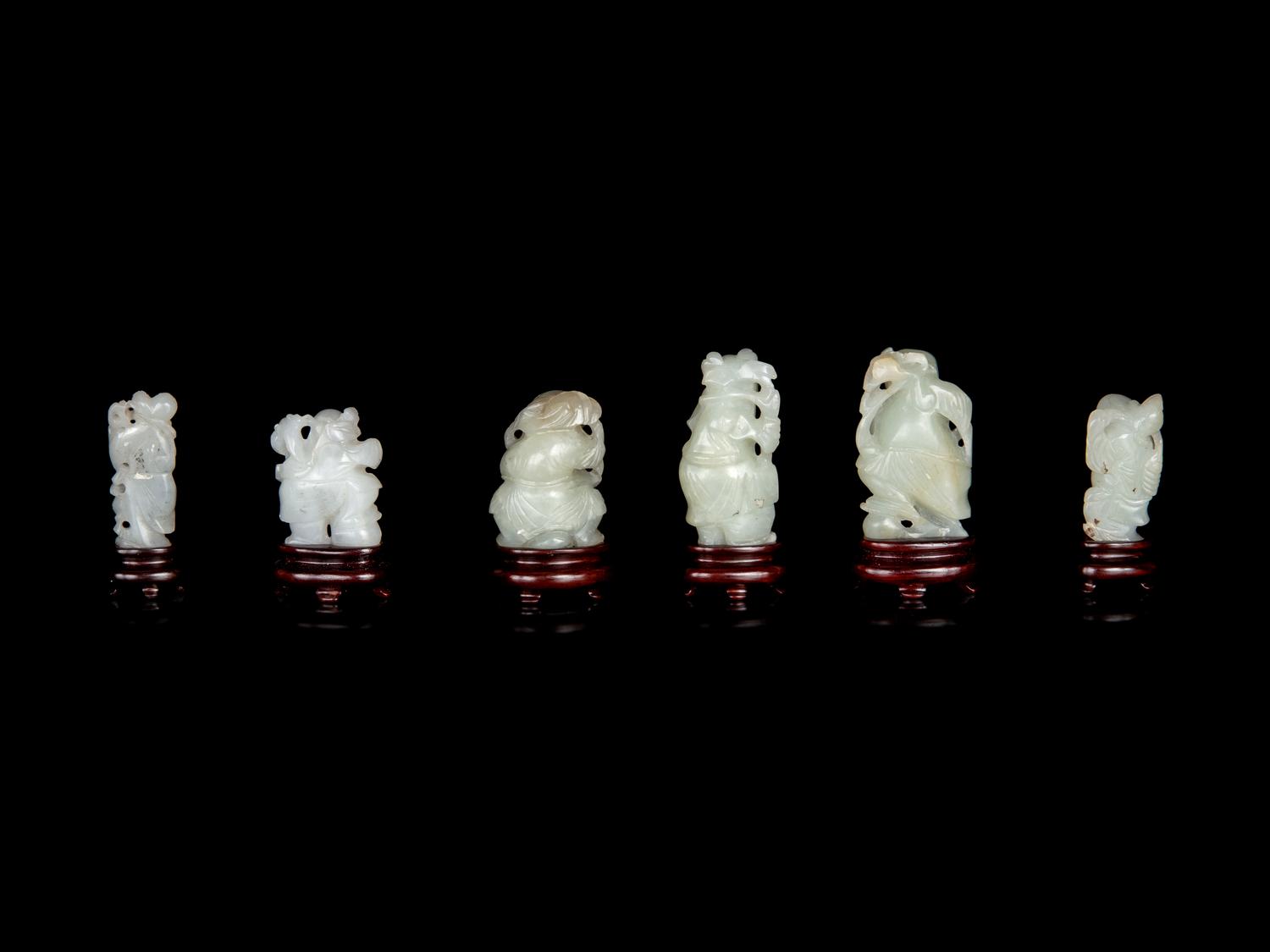 Six Chinese Carved Celadon Jade Figures of Boys