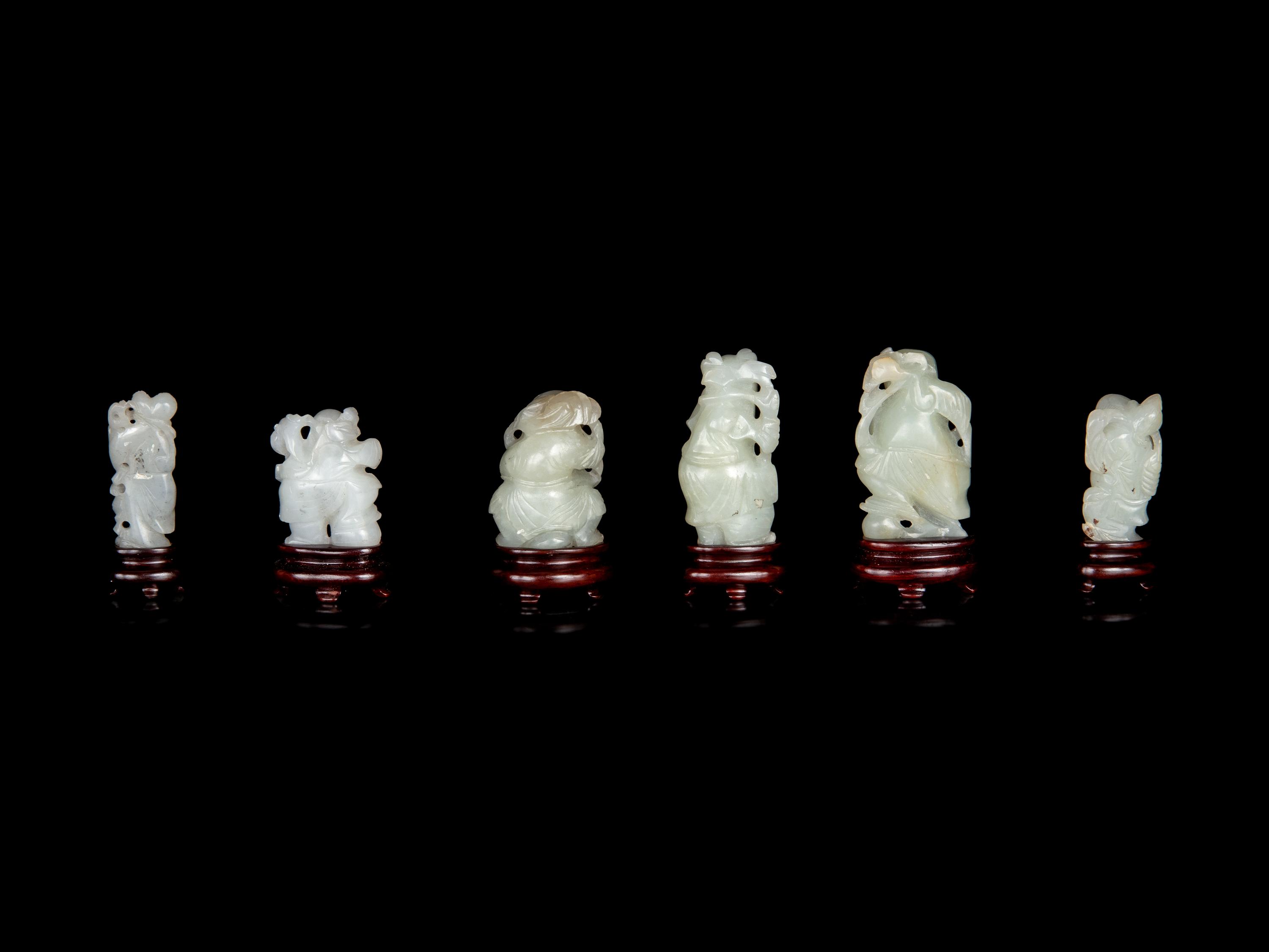 Six Chinese Carved Celadon Jade Figures of Boys