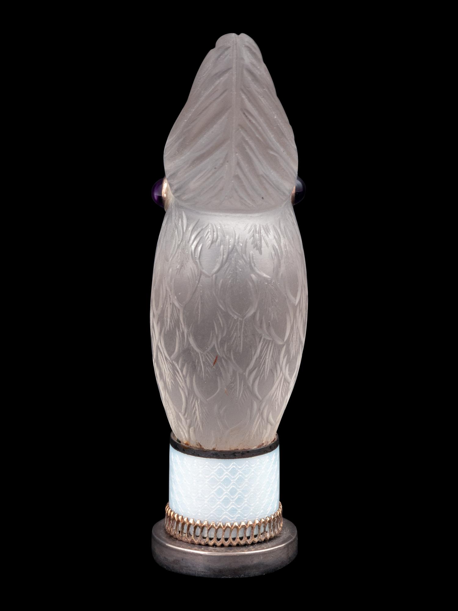 A Continental Carved Rock Crystal and Guilloche Enamel-Mounted Cockatiel-Form Hand Seal