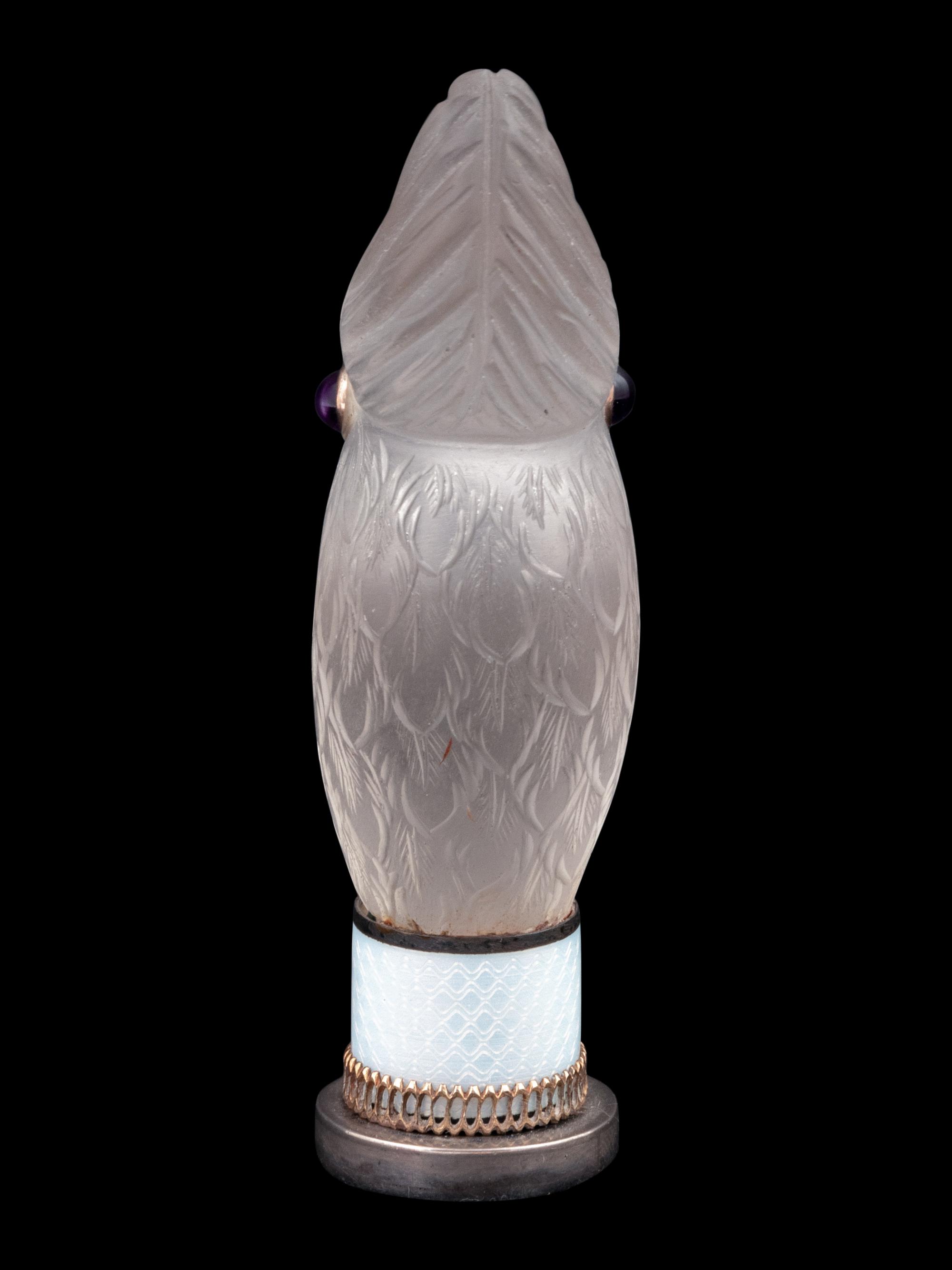 A Continental Carved Rock Crystal and Guilloche Enamel-Mounted Cockatiel-Form Hand Seal