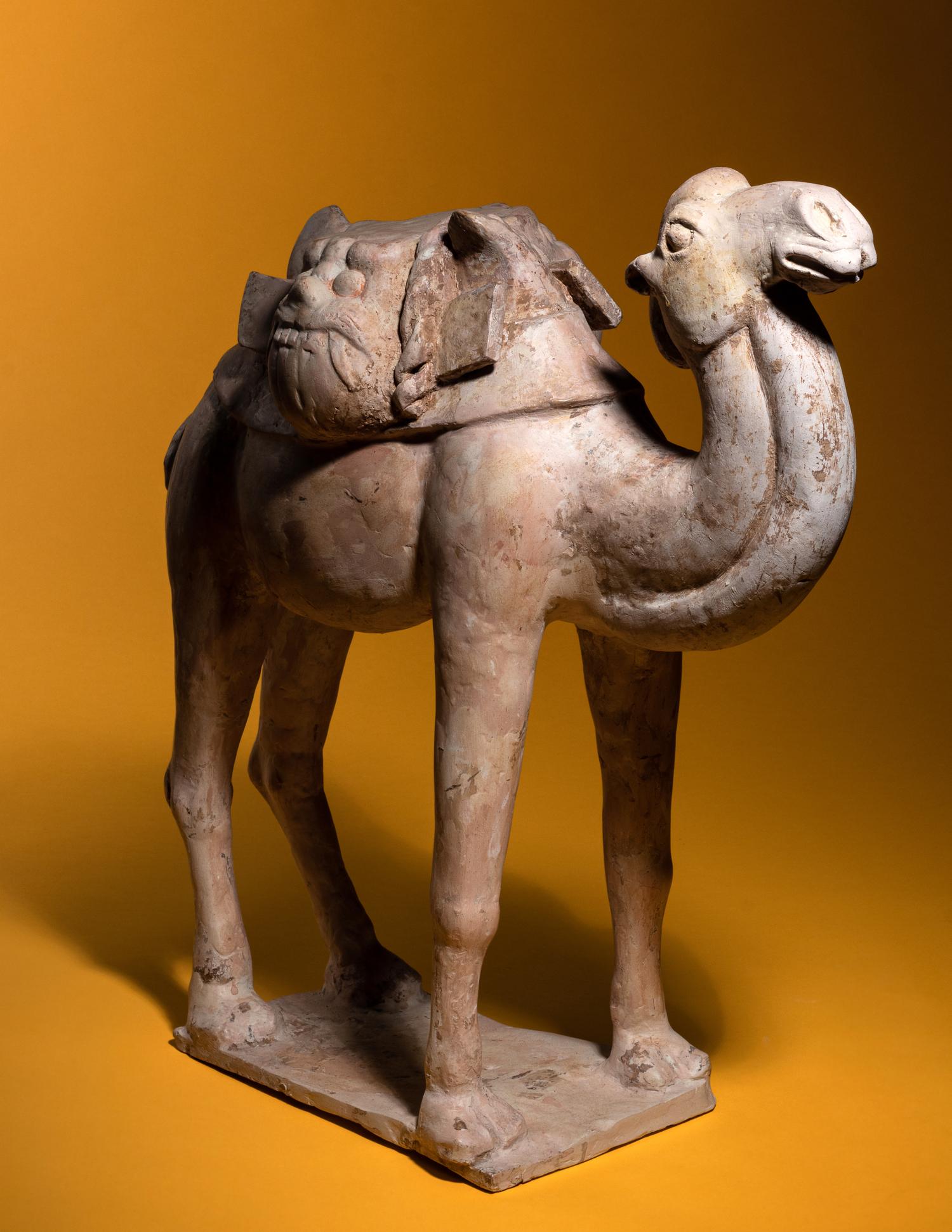 A Painted Pottery Figure of a Camel