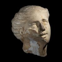 A Roman Marble Head of a Goddess