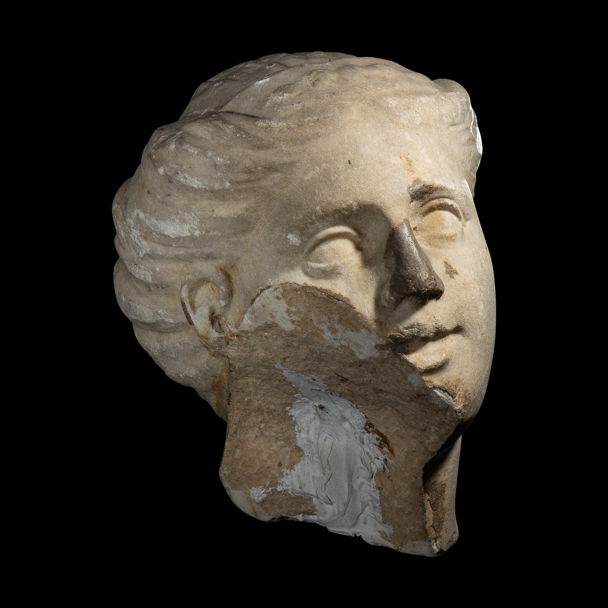 A Roman Marble Head of a Goddess