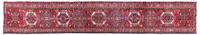 A Persian Wool Runner 2 feet 9 inches x 16 feet 3 inches.
