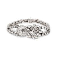 PLATINUM AND DIAMOND SURPRISE WATCH